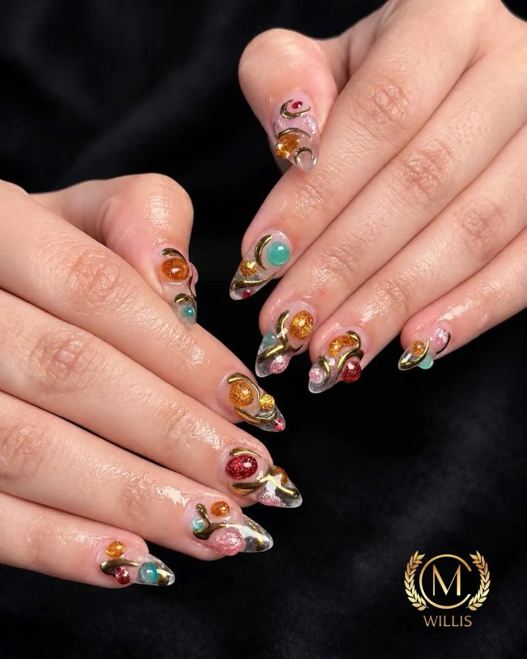 Almond nails with amber jelly 3D beads and swirl nail art