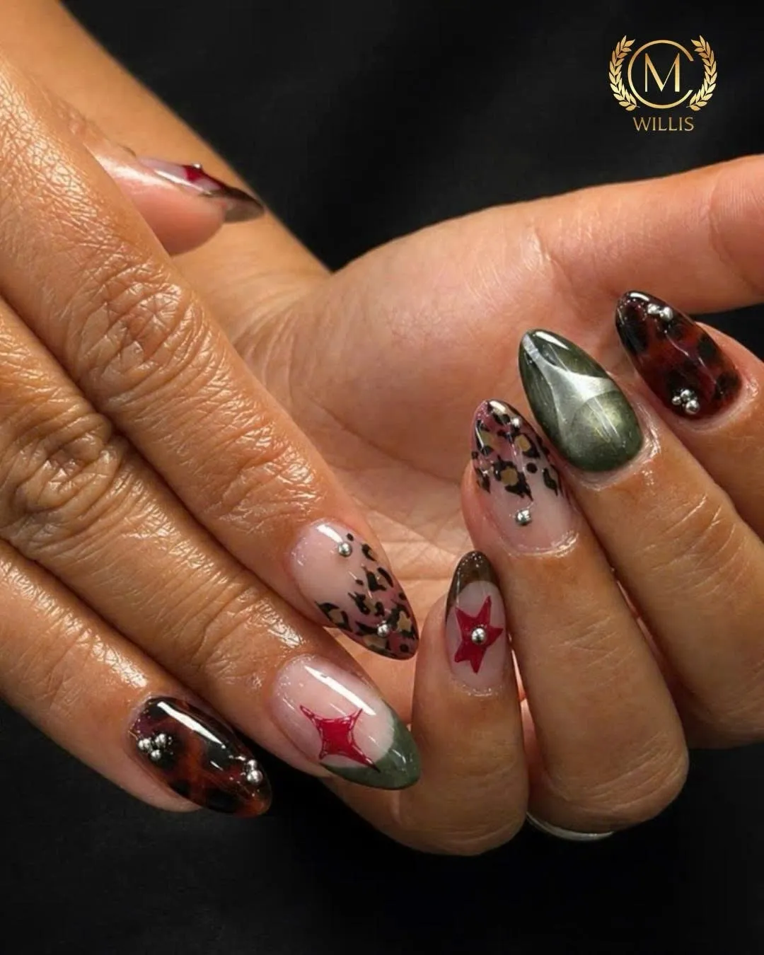 Mixed nail set with silver chrome, leopard print and red star accents